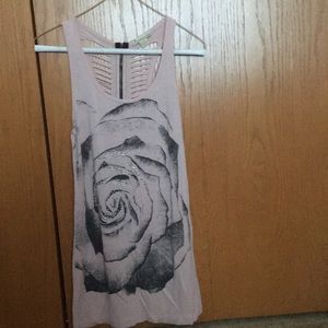 Pink rose shirt with zipper and rips in the back